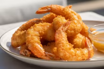 Crevettes croustillantes et sauce au miel : testez cette recette magique